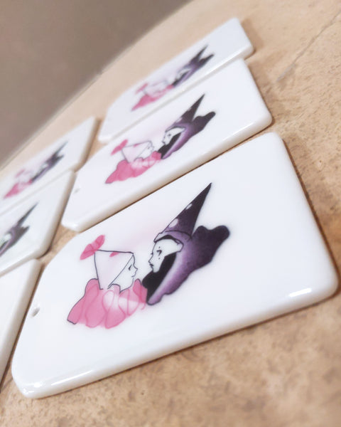Porcelain Decal Tag Tile [Black and Pink Pierrots in Love]