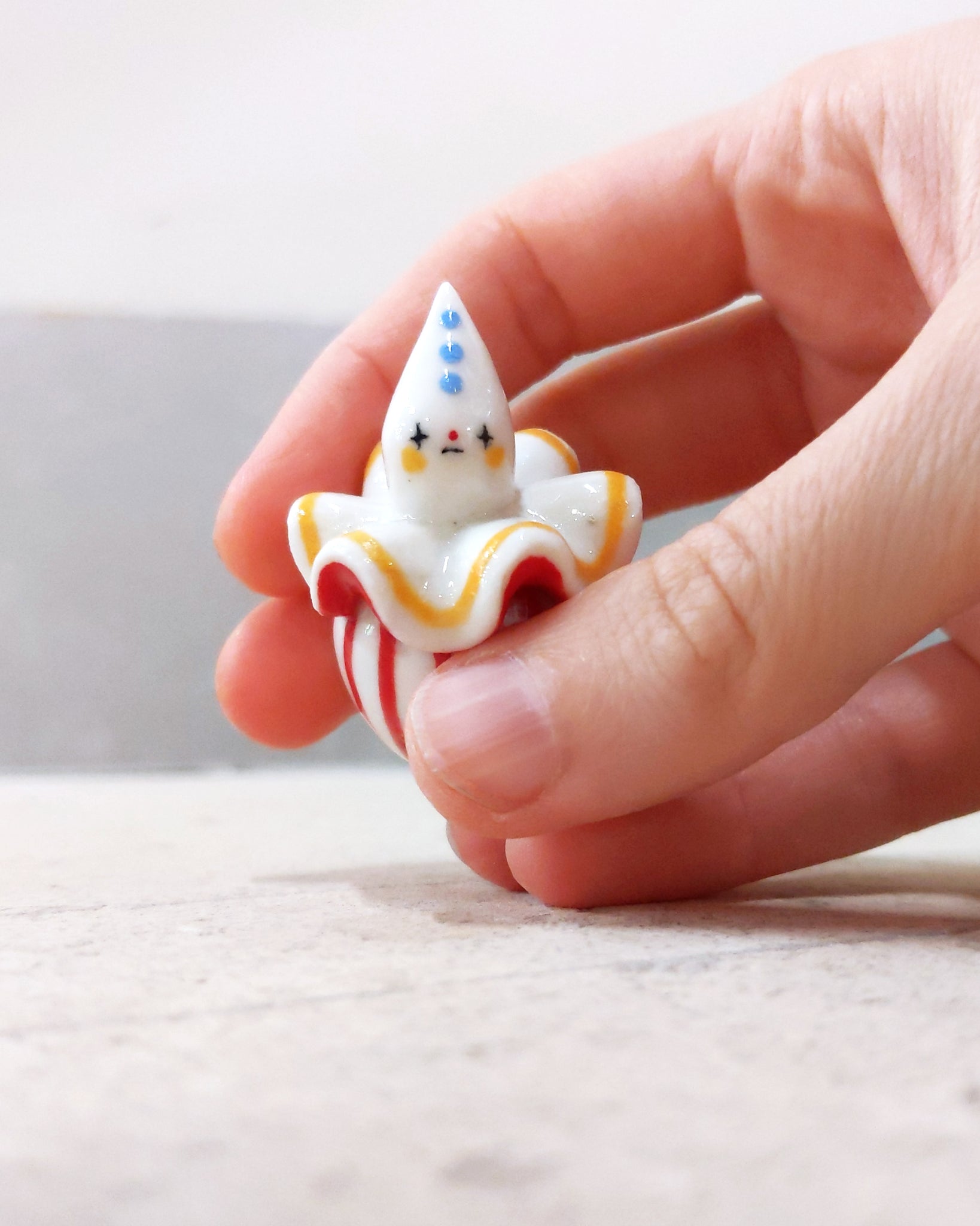 goatPIERROT Ceramic Art Toy [BB23.120: Twinkle Eyed Popcorn Bag Pierrot Birbauble, 1.75" tall]