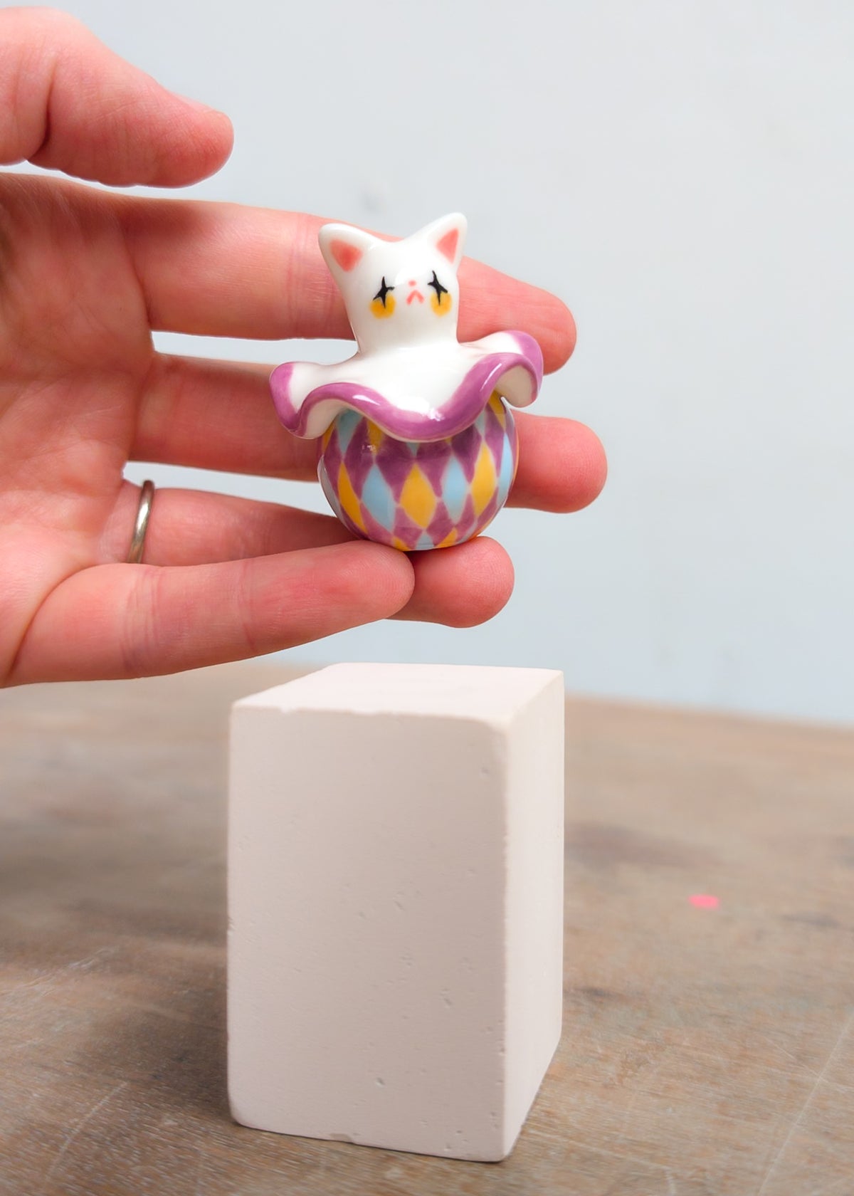 goatPIERROT Ceramic Art Toy 26.09.02 [Twinkle-Eyed Pierrot Cat in Purple, Yellow, and Blue Harlequin Print]