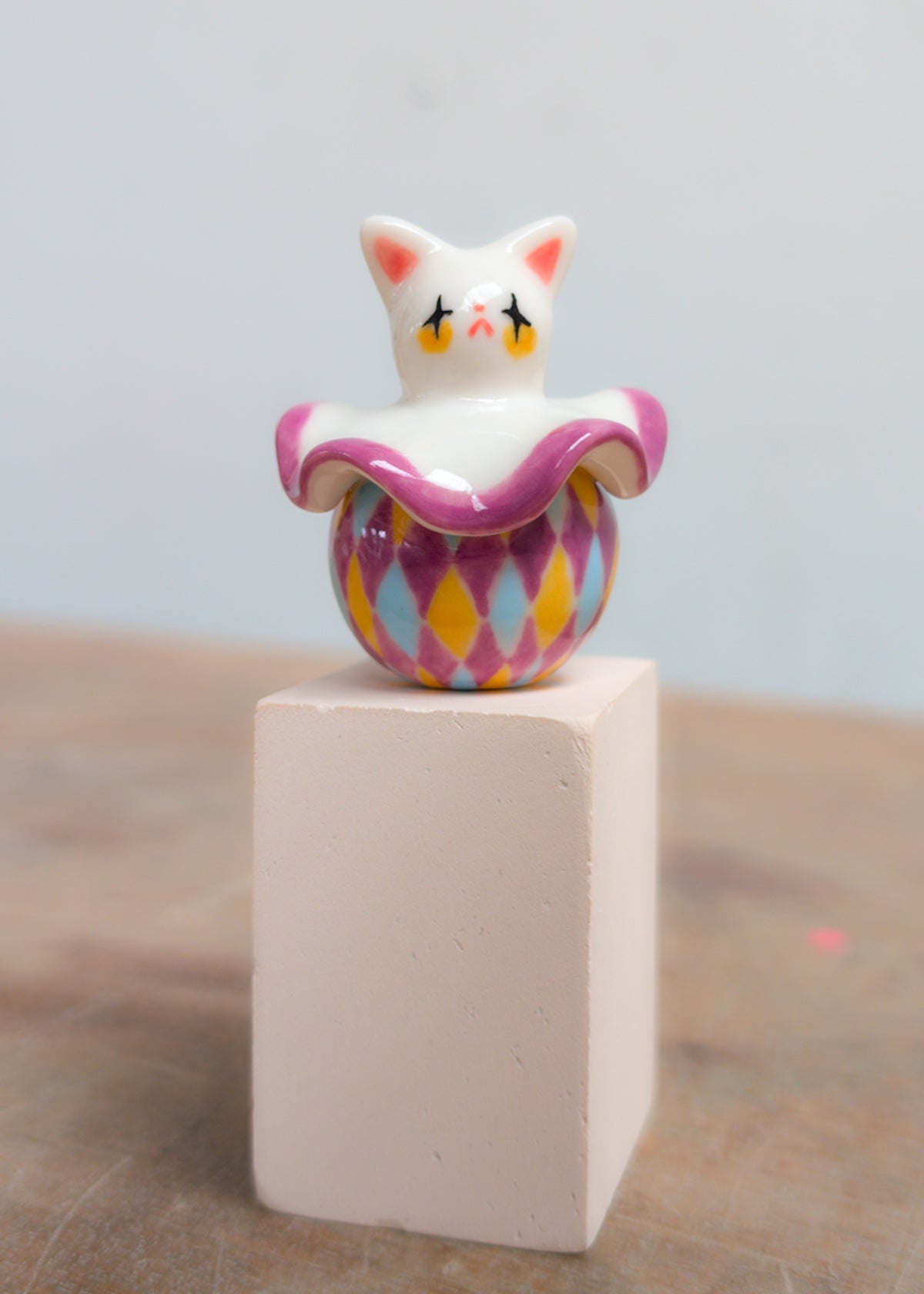 goatPIERROT Ceramic Art Toy 26.09.02 [Twinkle-Eyed Pierrot Cat in Purple, Yellow, and Blue Harlequin Print]