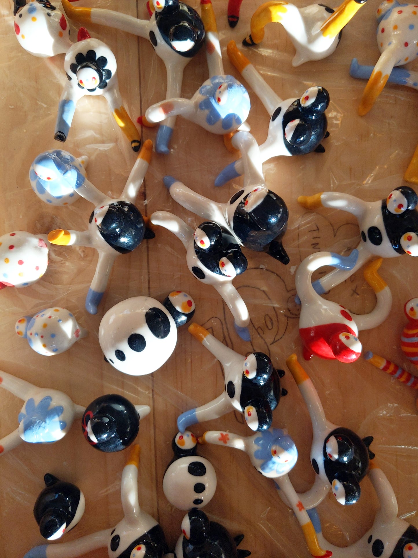 Tinybirdman Ceramic Art Toy [22.007: Two-headed, Left Knee Up]