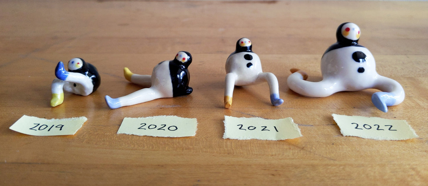 Tinybirdman Ceramic Art Toy [22.007: Two-headed, Left Knee Up]