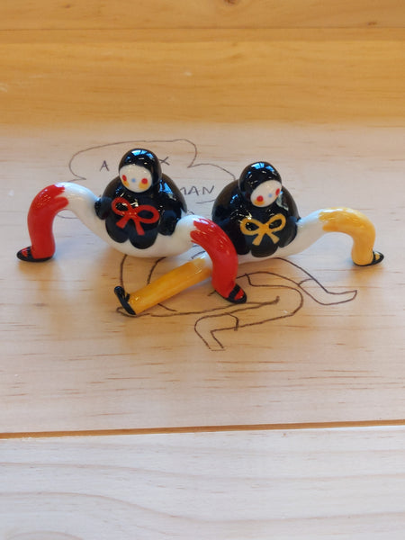 Tinybirdman Ceramic Art Toy Duo [22.053 and 22.054: Black Capelet with Bow, Red and Yellow]