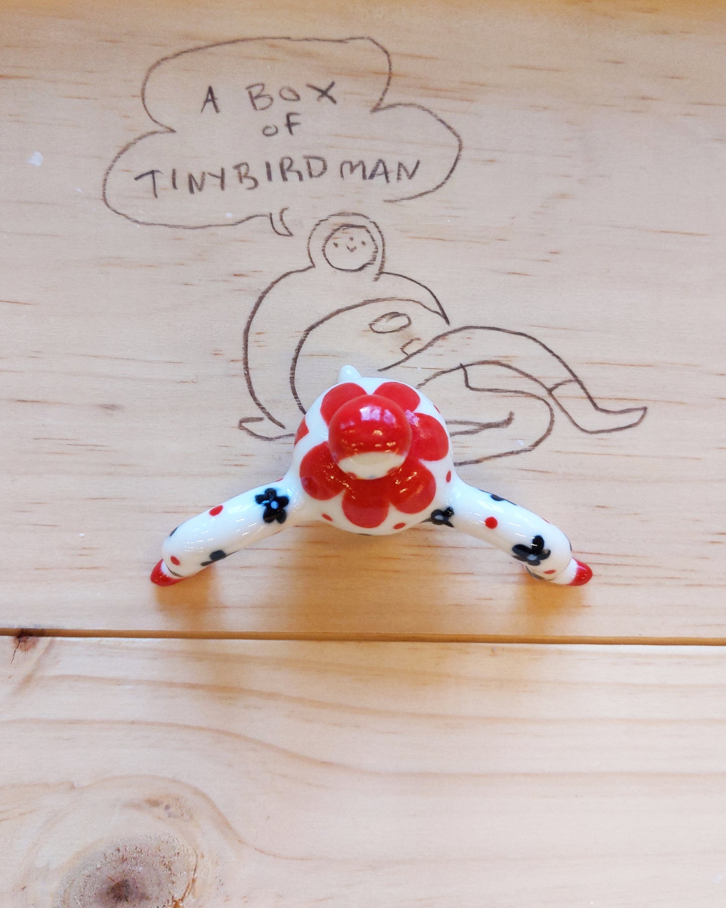 Tinybirdman Ceramic Art Toy [22.064: Red Flower Matryoshka with Falling Petal]