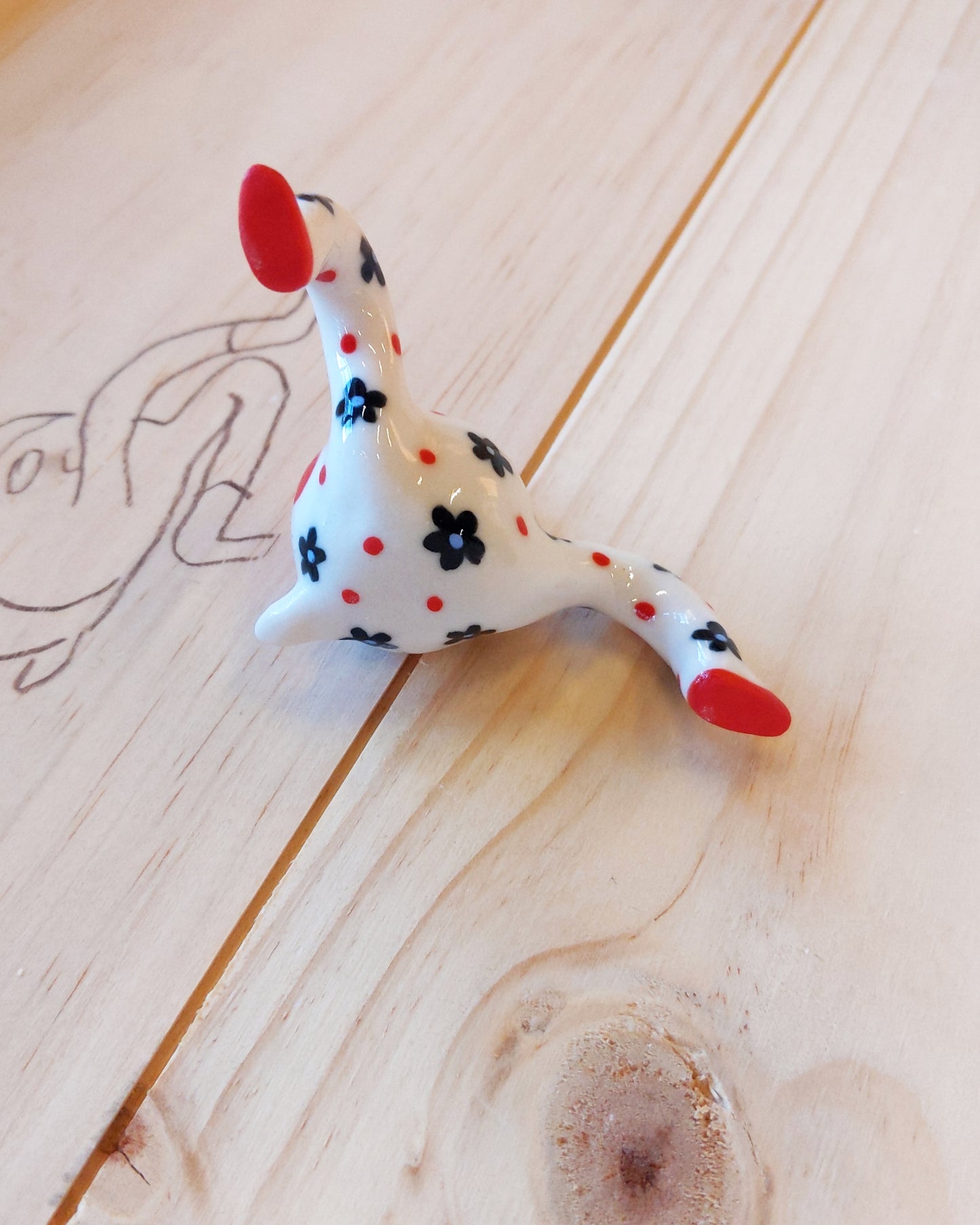 Tinybirdman Ceramic Art Toy [22.064: Red Flower Matryoshka with Falling Petal]
