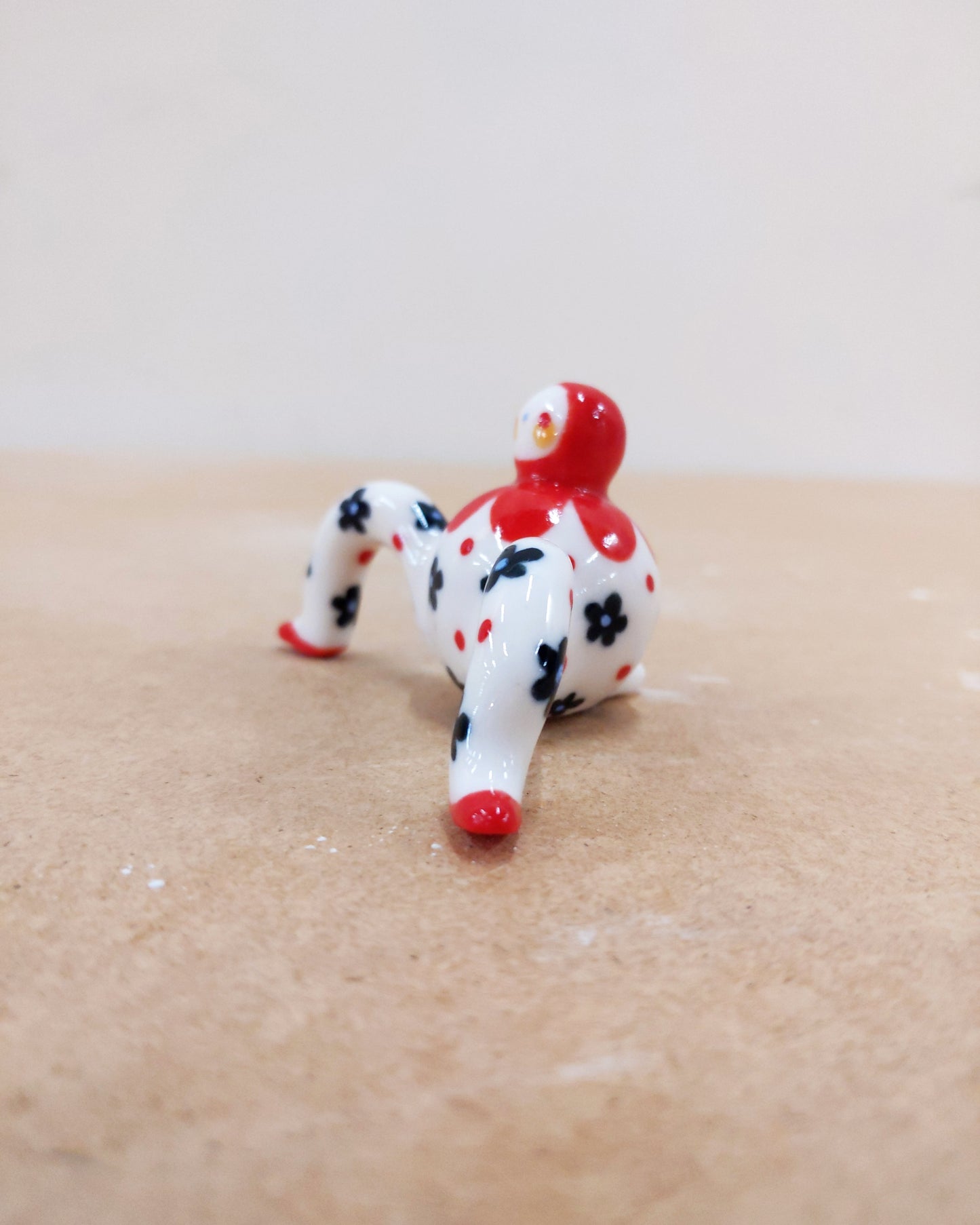 Tinybirdman Ceramic Art Toy [22.064: Red Flower Matryoshka with Falling Petal]