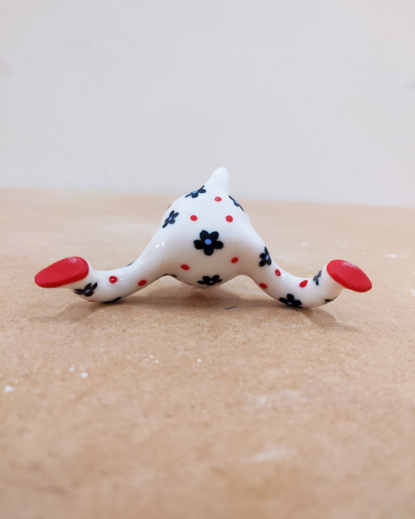 Tinybirdman Ceramic Art Toy [22.064: Red Flower Matryoshka with Falling Petal]