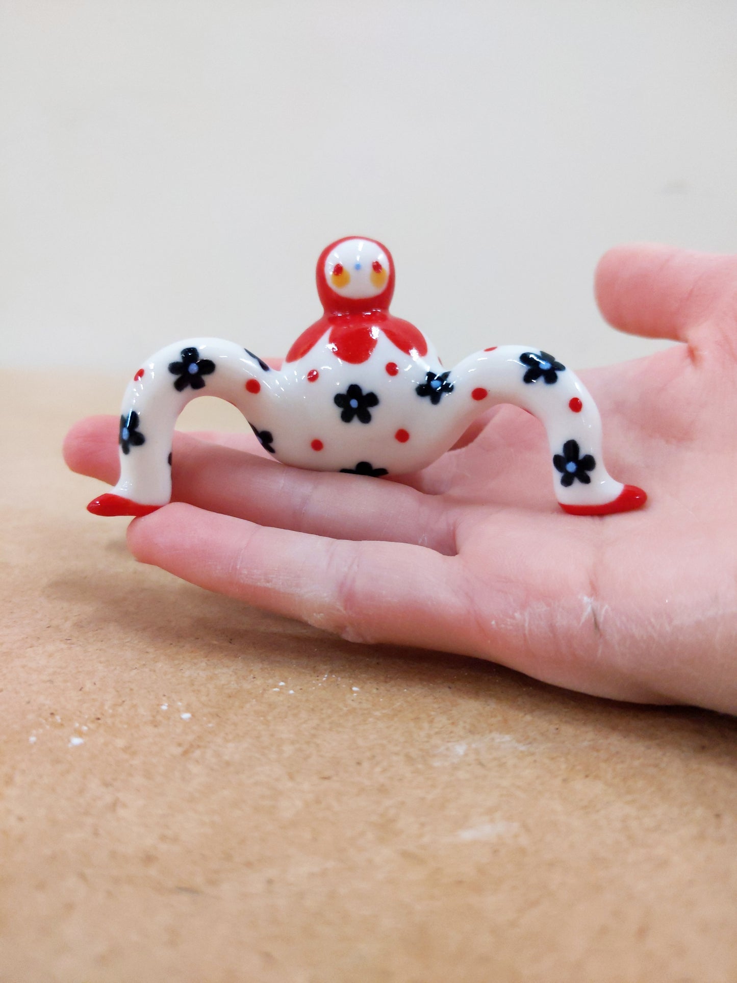 Tinybirdman Ceramic Art Toy [22.064: Red Flower Matryoshka with Falling Petal]