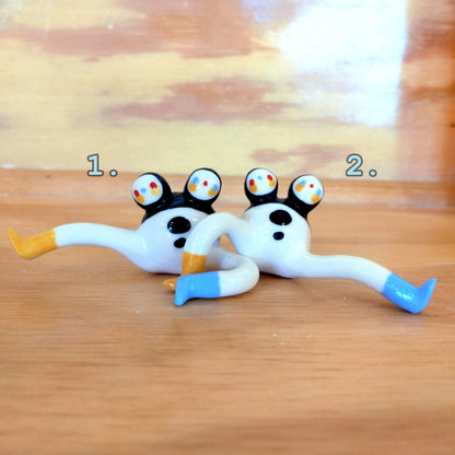 Tinybirdman Ceramic Art Toy [22.001 and 22.002: Two-Headed Tinybirdman with Inverse Right Face, Right Knee Up, Batch of Two]